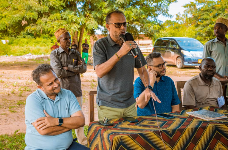 Lalji foundation representative adressing iftar beneficiaries during ramadan 2026