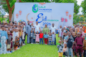 Lalji foundation representatives with orphaned children at eid celebration