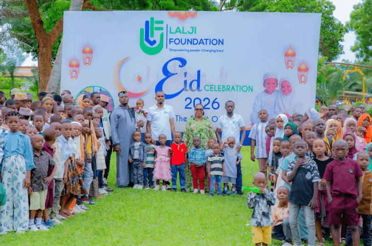 Lalji foundation representatives with orphaned children at eid celebration